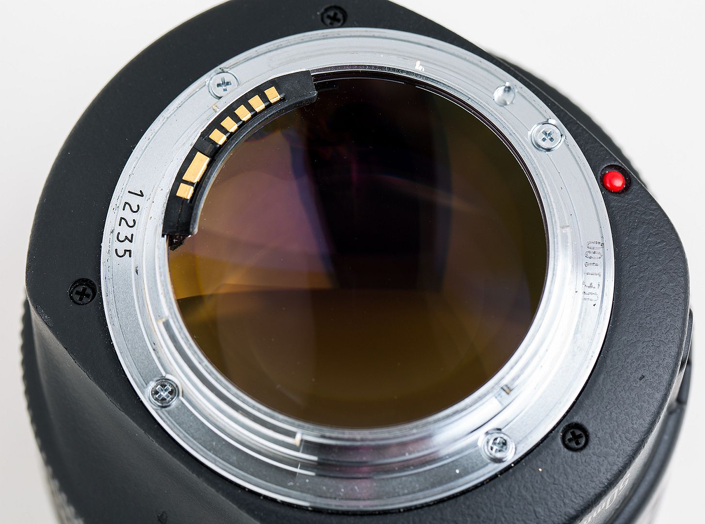 IMAGE: http://i282.photobucket.com/albums/kk258/Ken-Cravillion/50mm-back_zpscpl1scuu.jpg